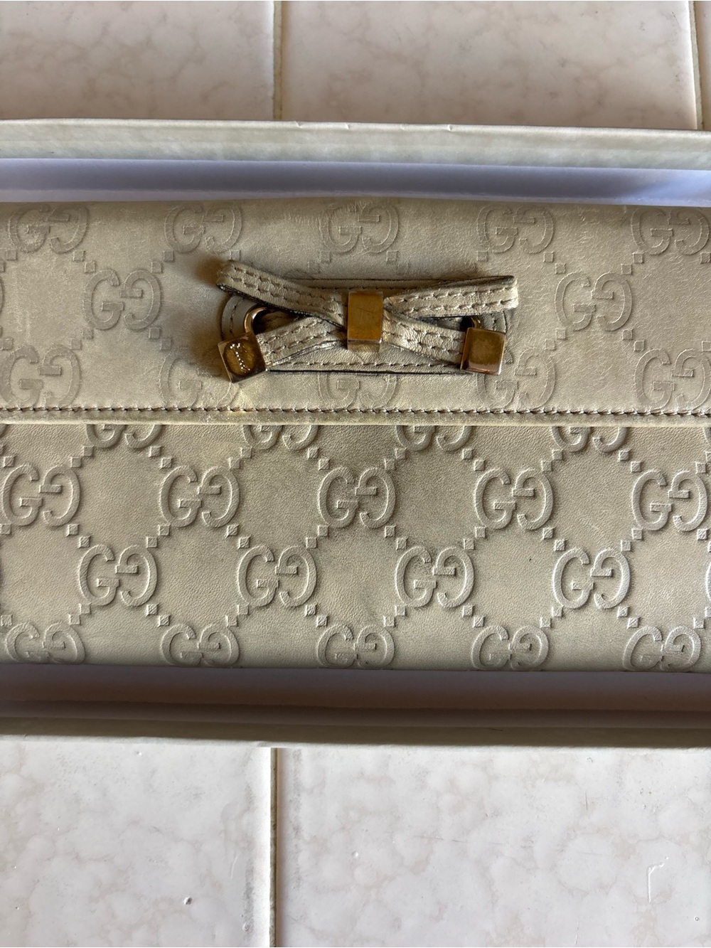 Gucci Beige Embossed GG Leather Bow Wristlet Clutch